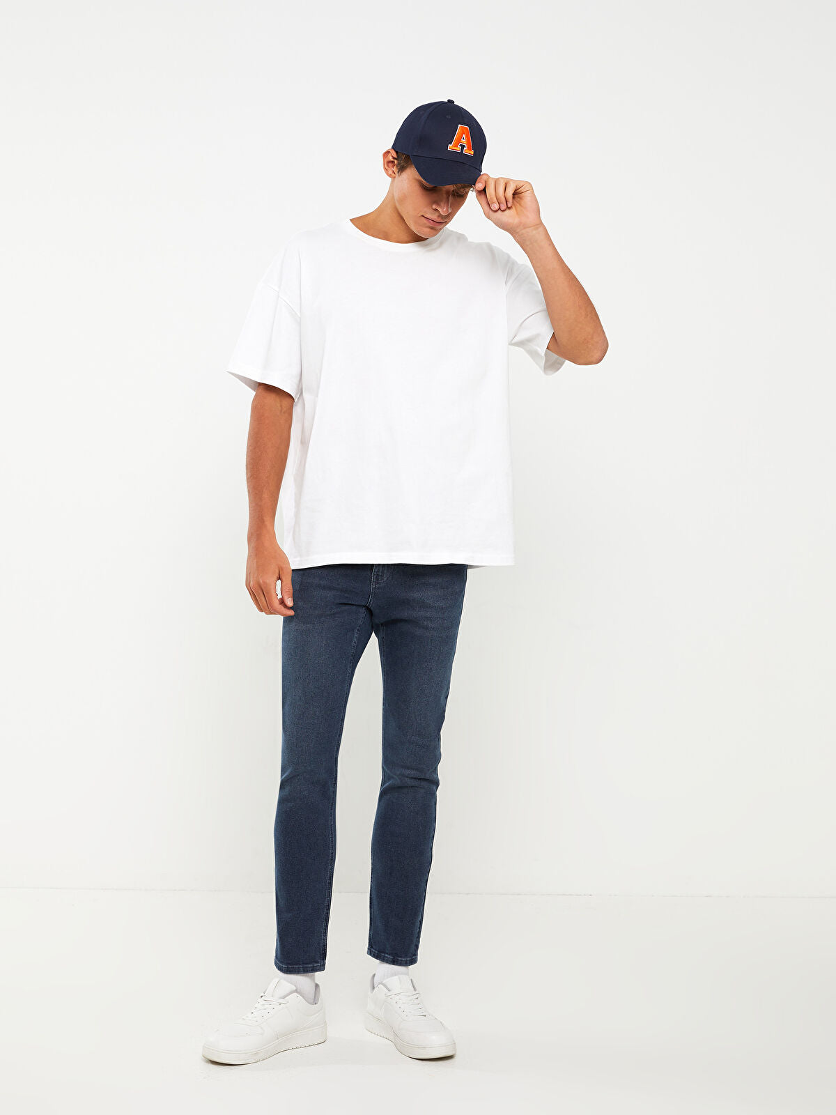 750 Slim Fit Men's Woven Jean Pantalon