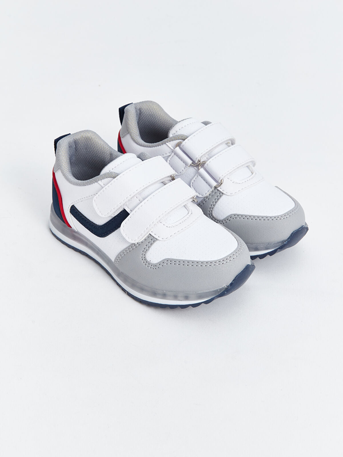 Light-up sole for boys' sports shoes