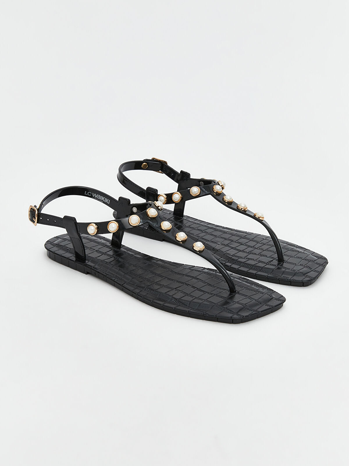 Woman's jeweled between-finger slippers