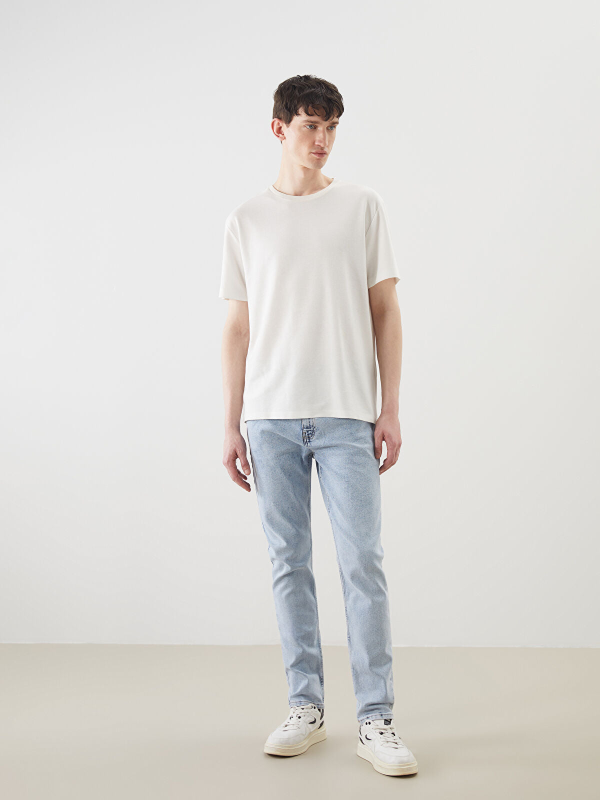 750 Slim Fit Men's Woven Jean Pantalon
