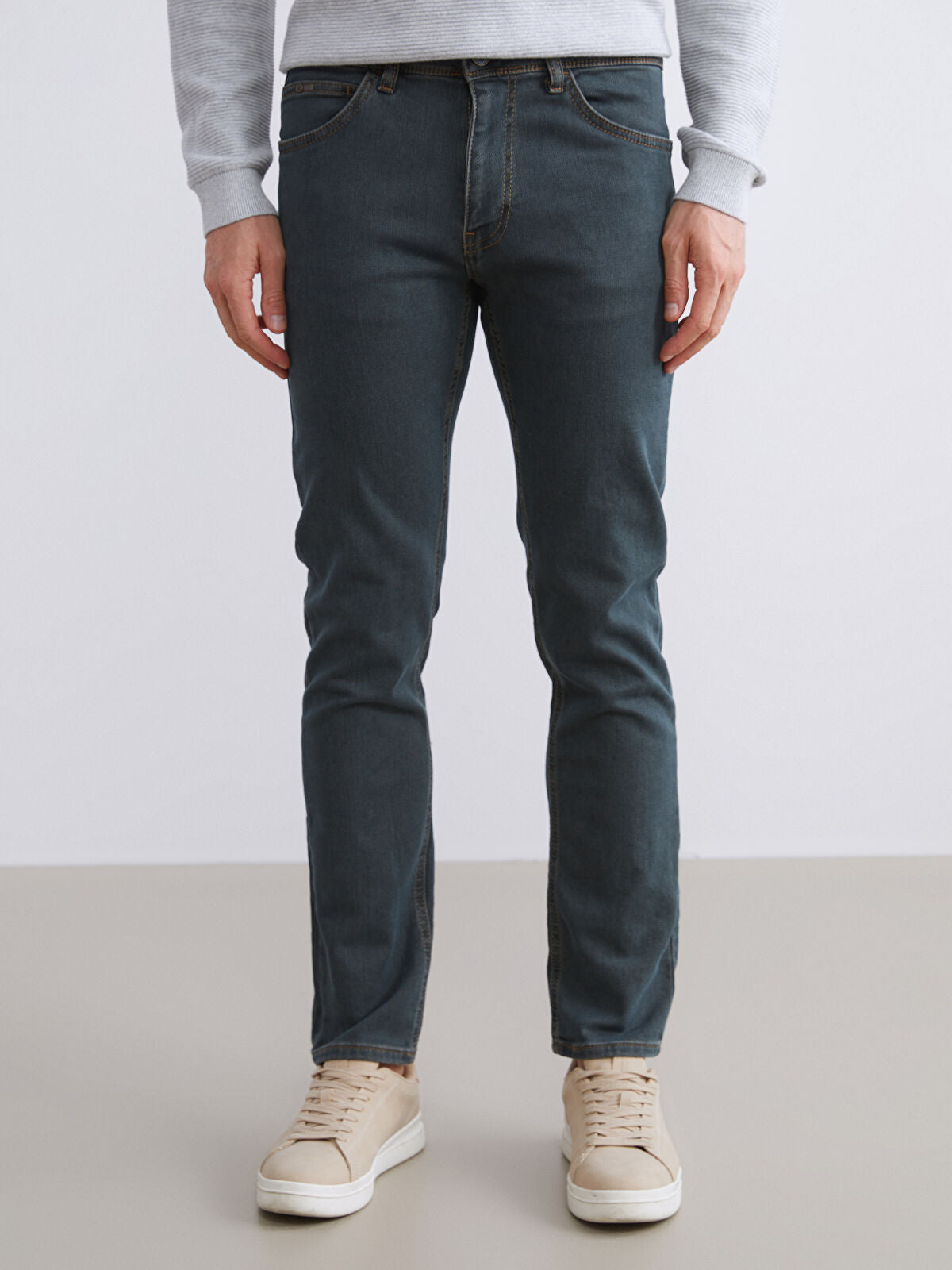 750 Slim Fit Men's Woven Jean Pantalon