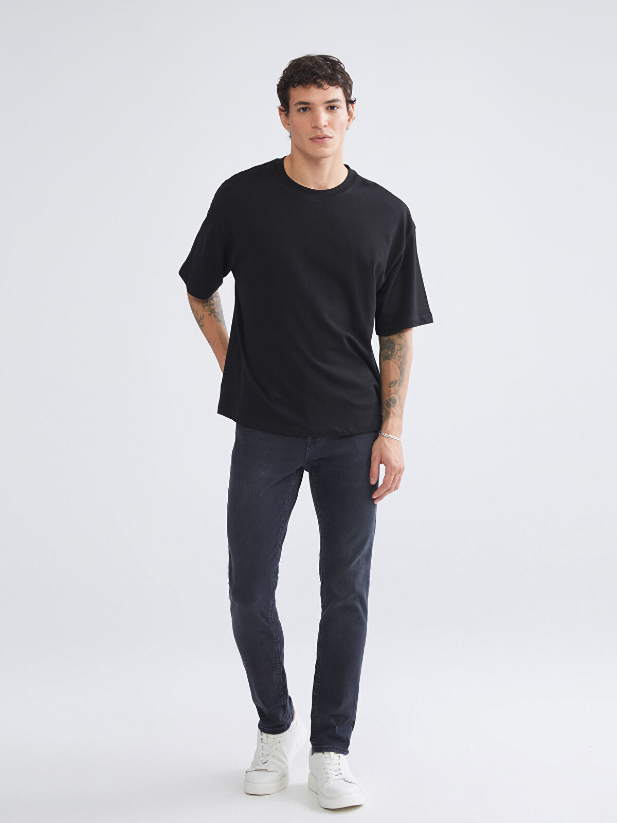 750 Slim Fit Men's Woven Jean Pantalon