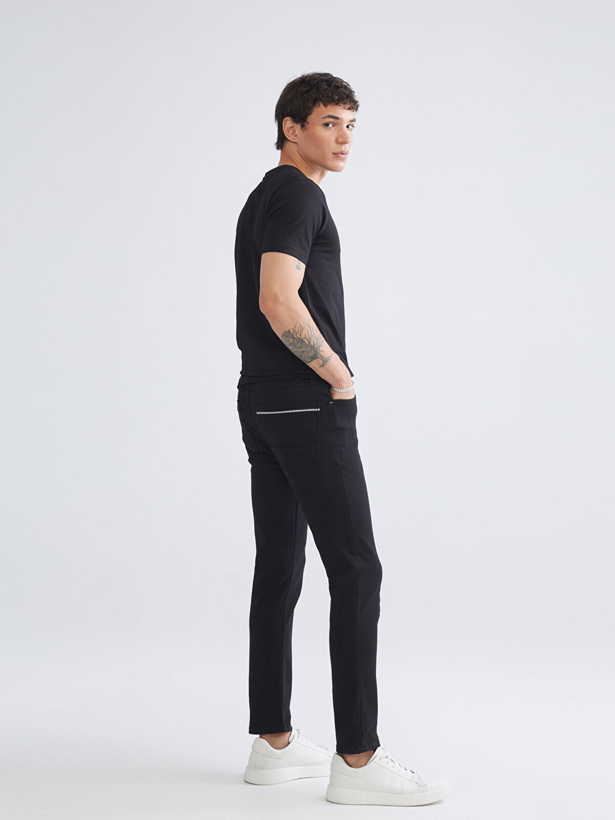 750 Slim Fit Men's Woven Jean Pantalon
