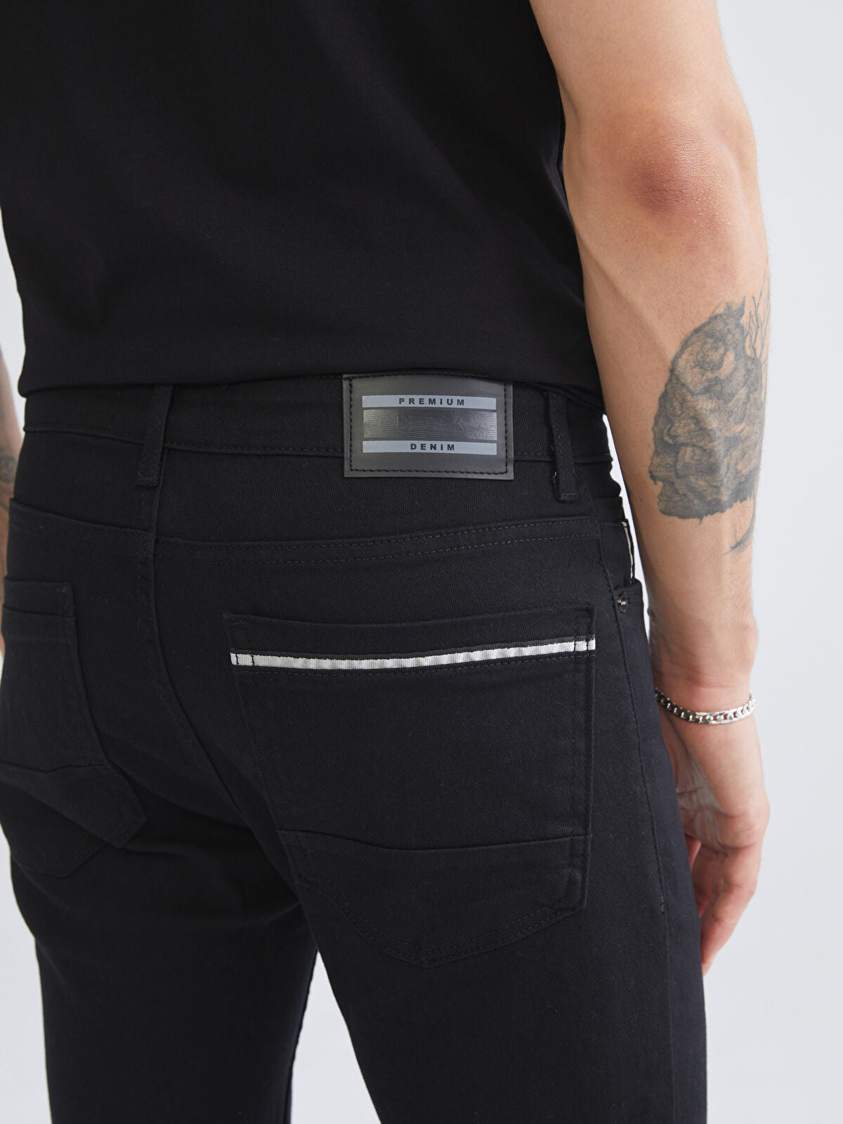 750 Slim Fit Men's Woven Jean Pantalon