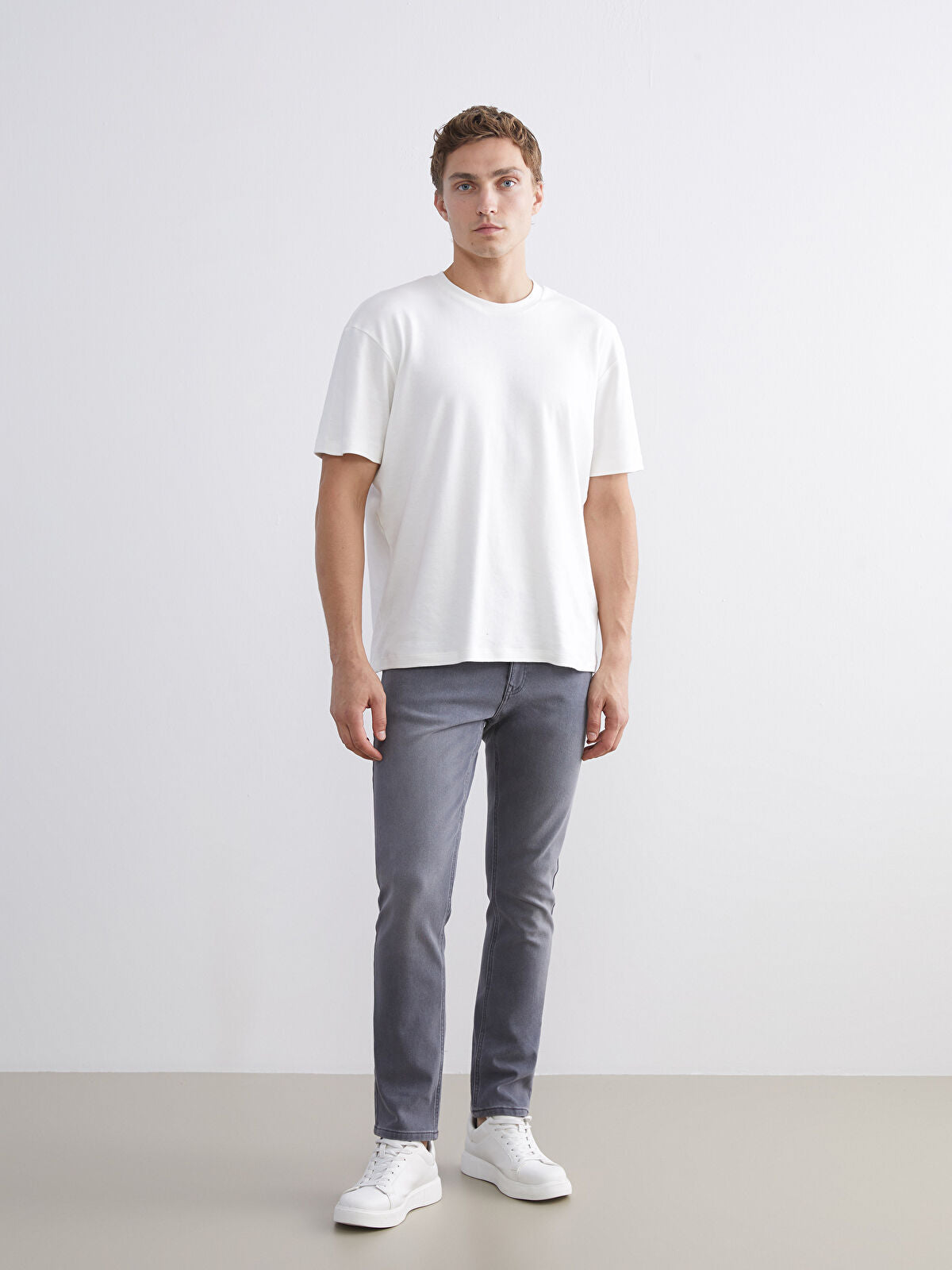 750 Slim Fit Men's Woven Jean Pantalon
