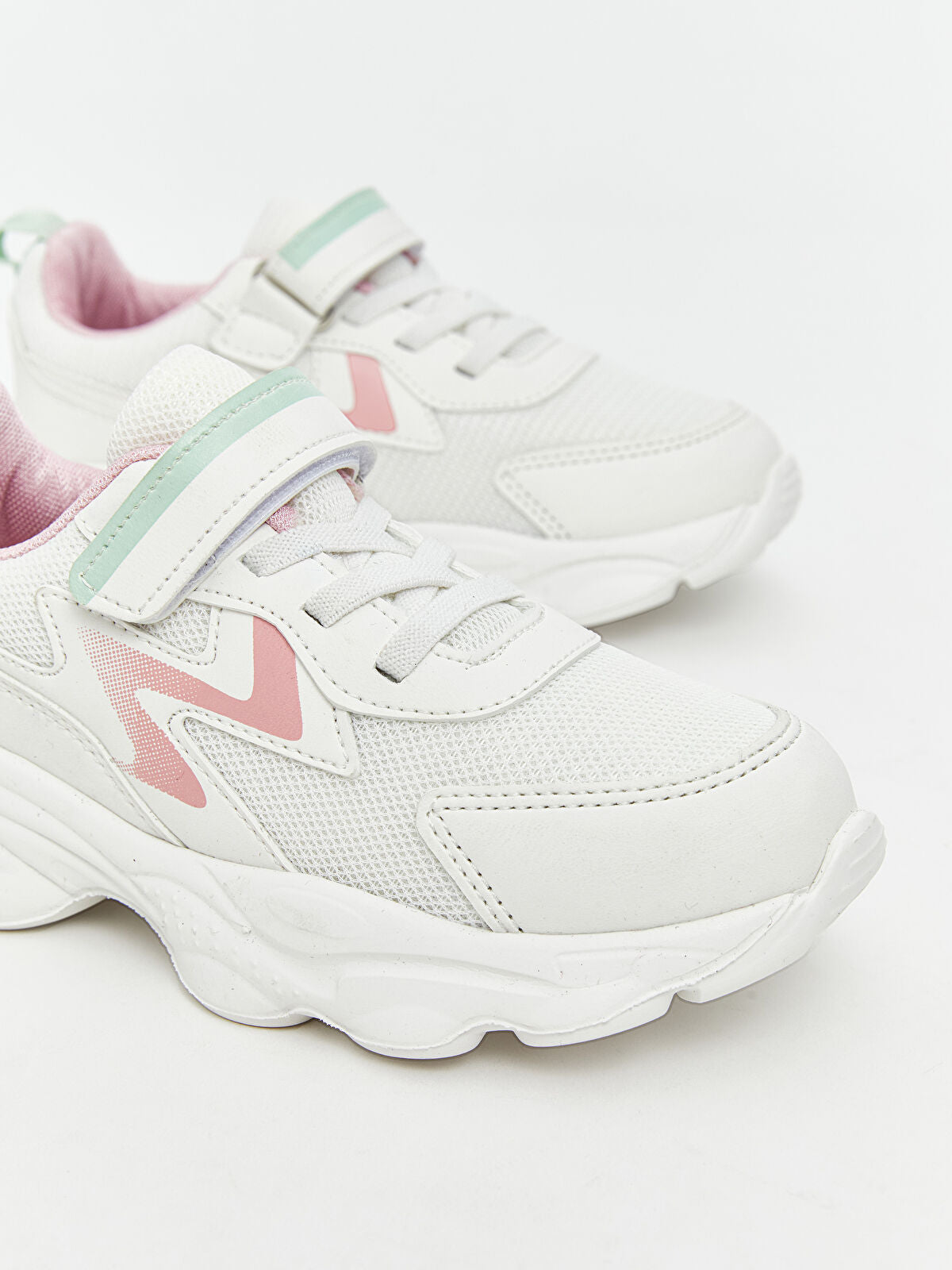 Strap-On and Crispy-Sounding Kids' Sports Shoes