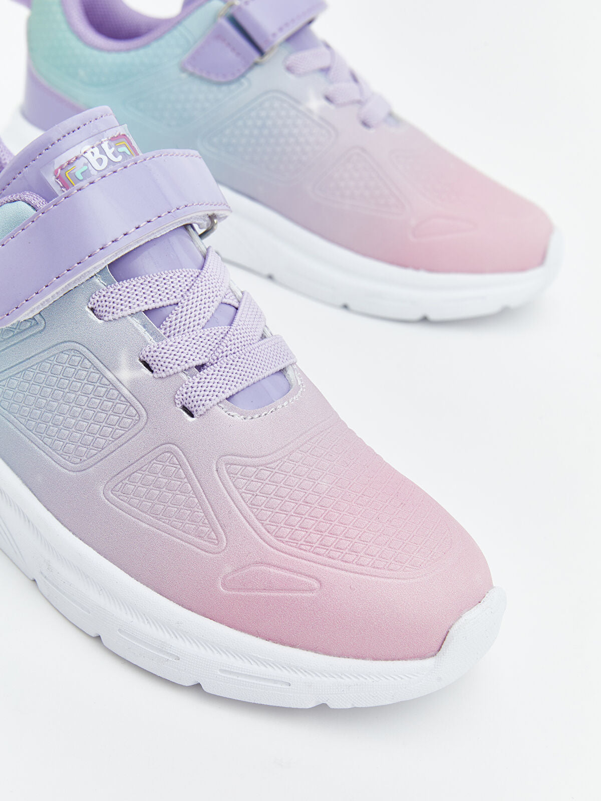 Strap-On and Crispy-Sounding Kids' Sports Shoes